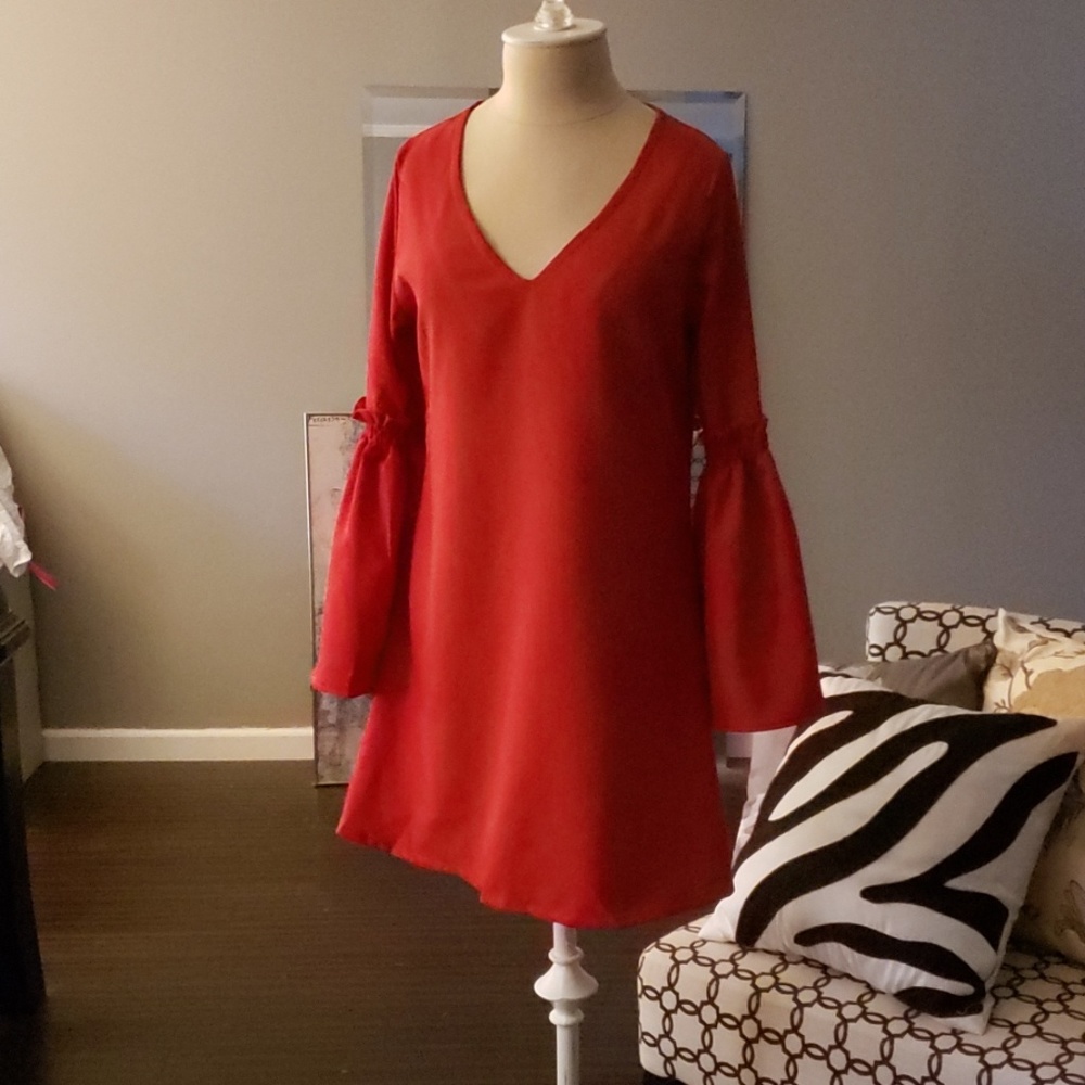 Red mini dress with bell sleeves